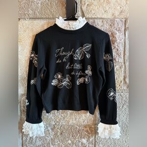 Alice + Olivia Black Sweater with White Floral Embroidery and Ruffle Neck